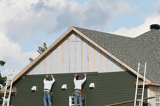 Professional Siding Contractor technician working in Adamsville, OH